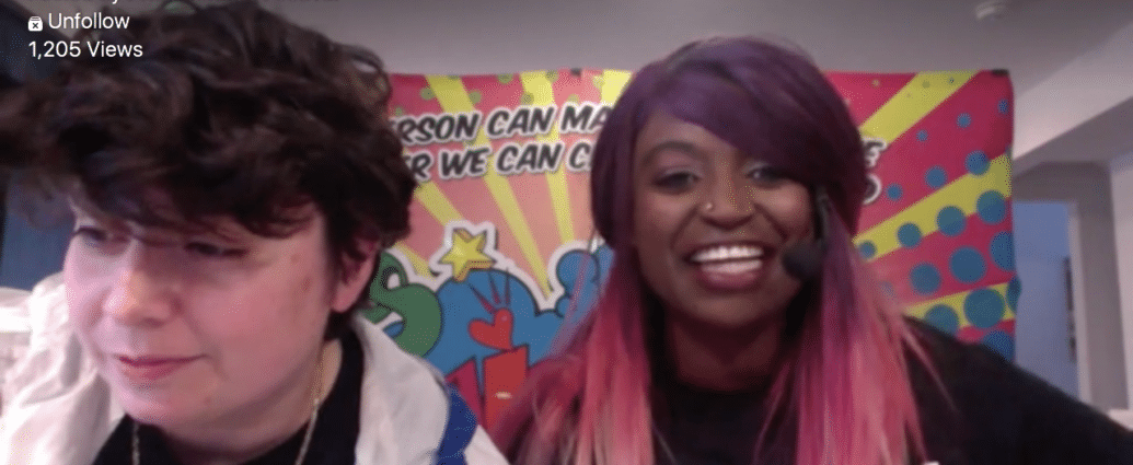 A screenshot of a virtual sign and dance alone Pride event, two people are sitting down speaking to the camera.