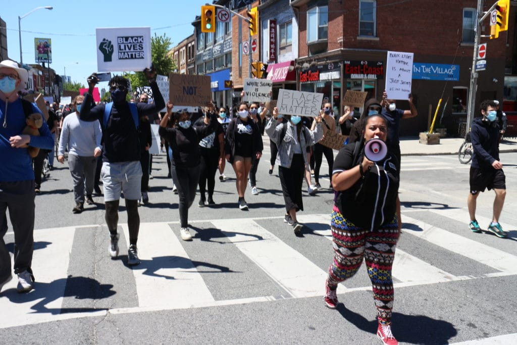 People marching on Bloor Street