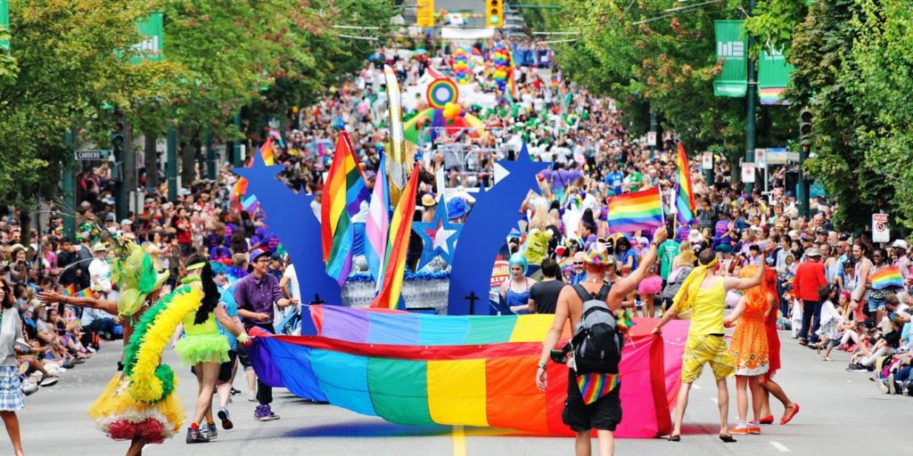 Marchers walk in the Vancouver Pride Parade