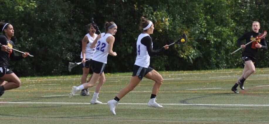 Western University women's lacrosse team in action against the Guelph Gryphons
