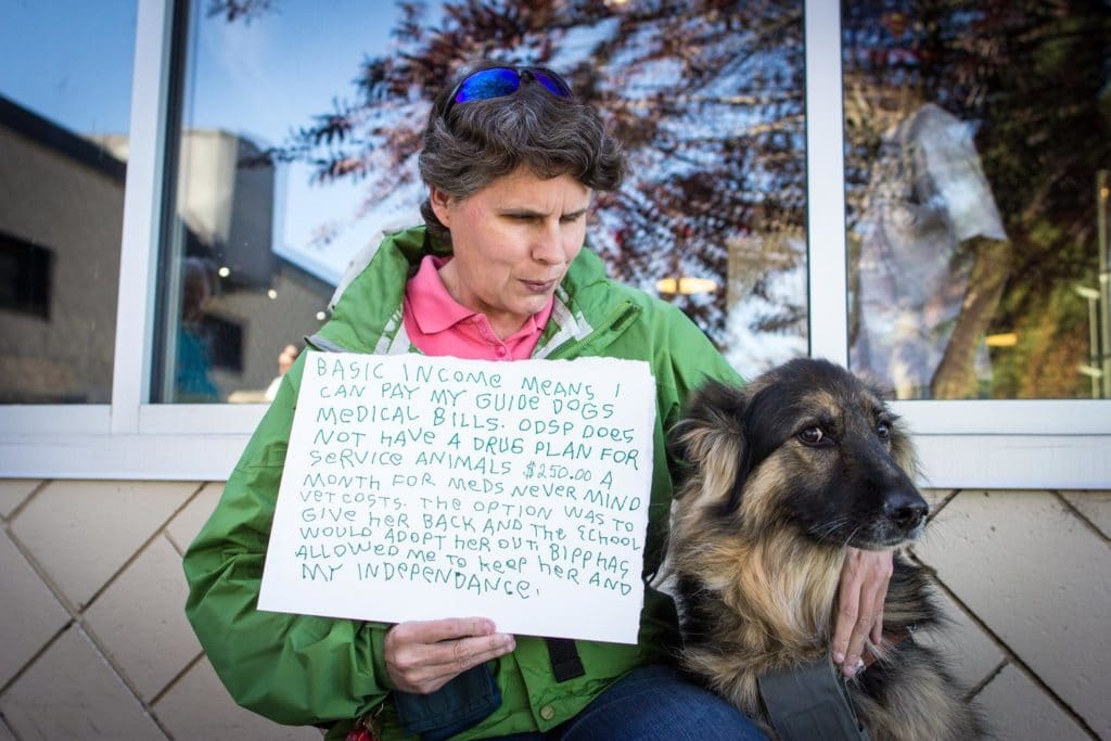 Portrait from Humans of Basic Income featuring dog owner